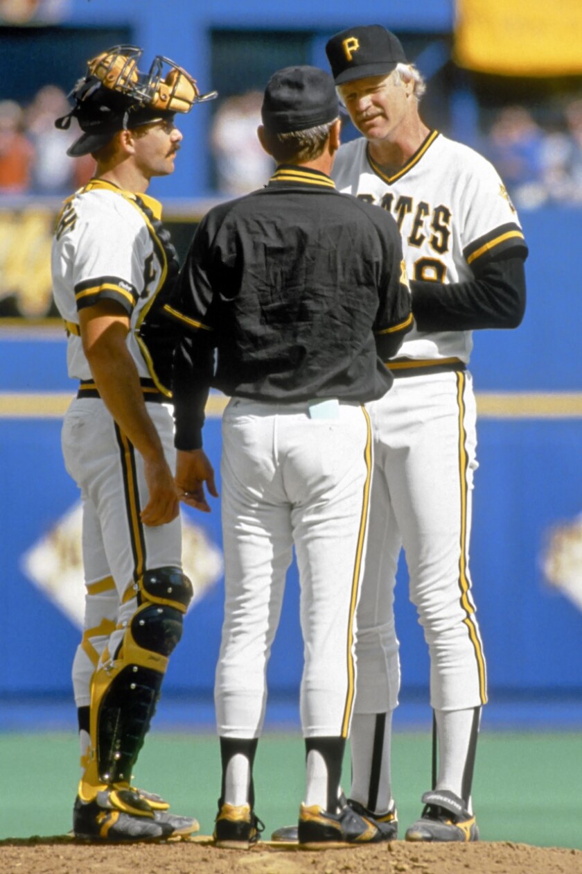 Jerry Reuss prepares to walk off the mound for the final time.