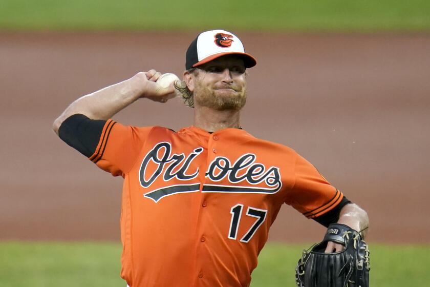 Baltimore Orioles starting pitcher Alex Cobb throws a pitch to the Boston Red Sox during the first inning of a baseball game, Saturday, Aug. 22, 2020, in Baltimore. (AP Photo/Julio Cortez)