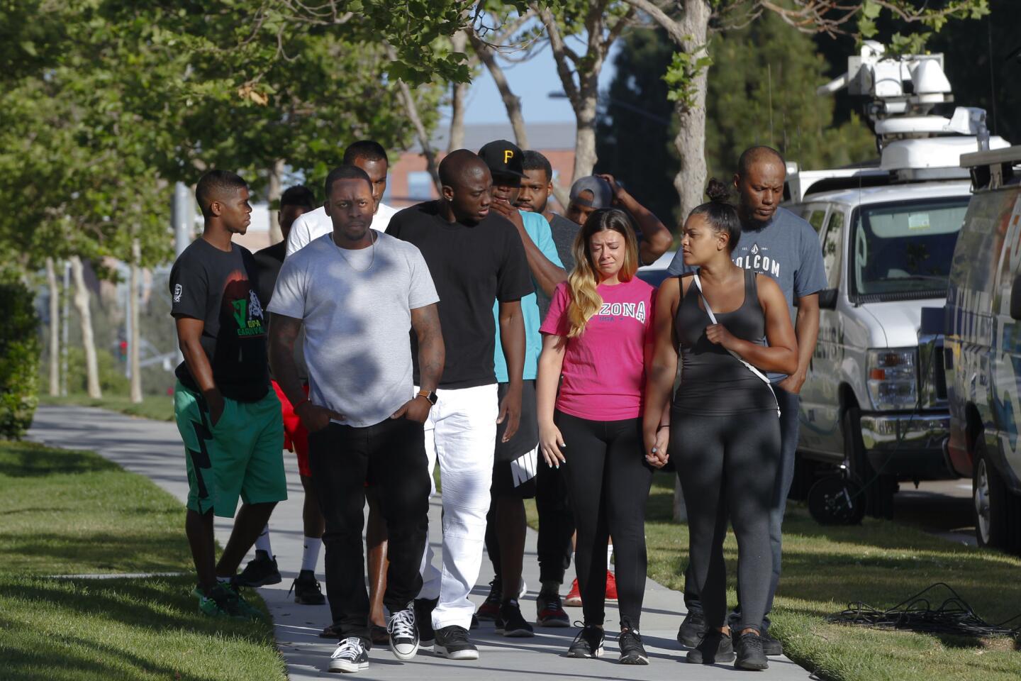 Walking to their press conference, victims who were at the shooting during a birthday party celebration last Sunday at the La Jolla Crossroads apartments, called for a press conference to speak with the news reporters.