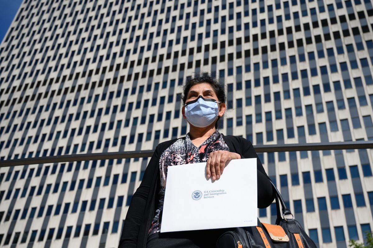 Azra Nazir receives her U.S. citizenship at Federal Plaza in New York after waiting 20 years.
