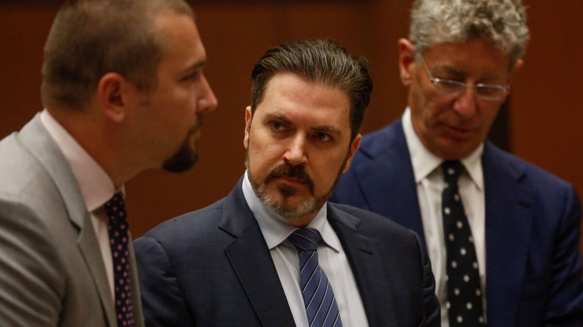 Pasquale Rotella, center, pictured in 2016, is chief executive of Insomniac. The rave promoter has agreed to settle a civil lawsuit filed by the Los Angeles Memorial Coliseum Commission, resulting in a payment of $3.5 million to the government agency.