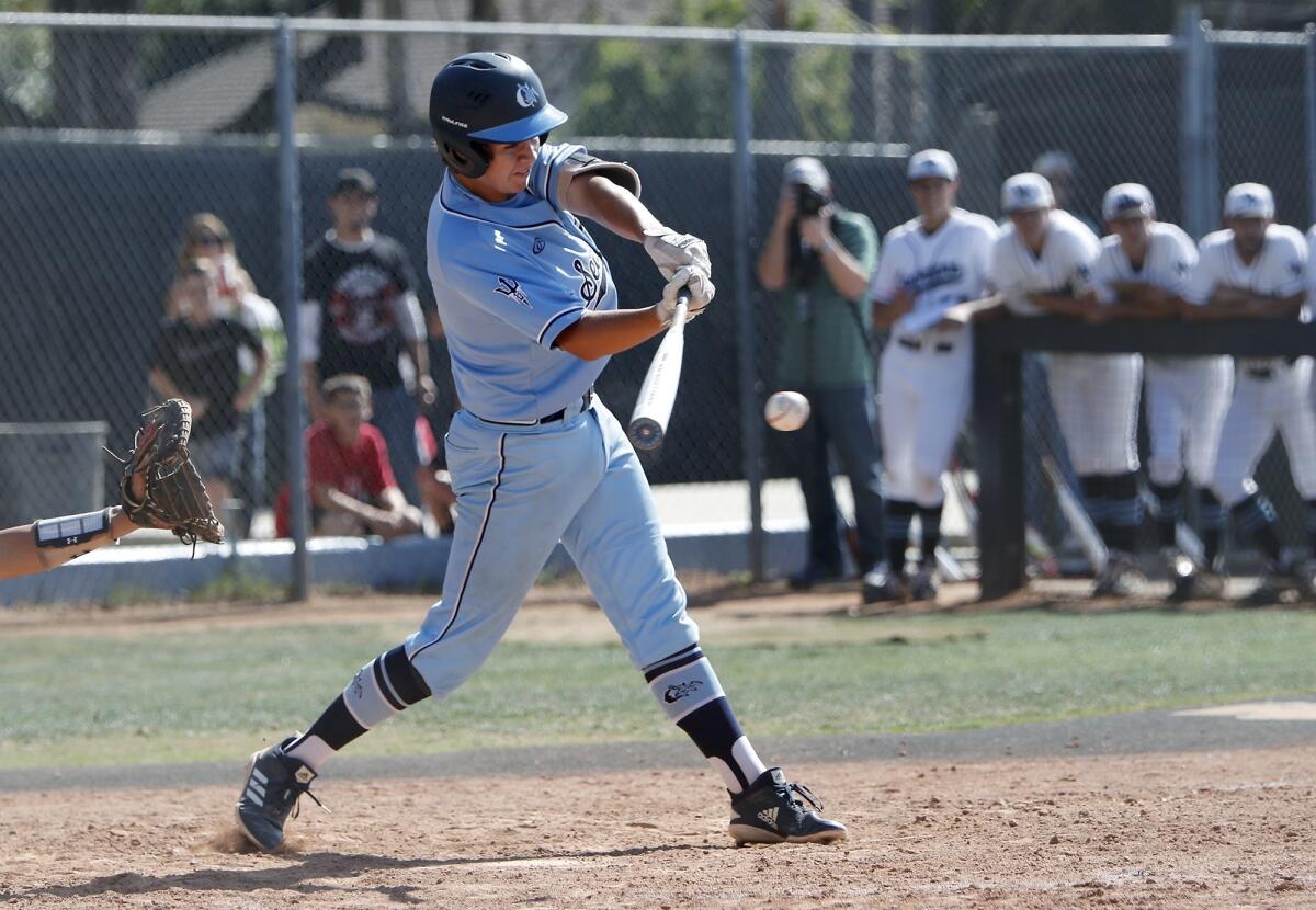 Corona del Mar High's Kieran Sidebotham singles in a run during the third inning in the first round of the CIF Southern Section Division 2 playoffs at Villa Park High on Friday.