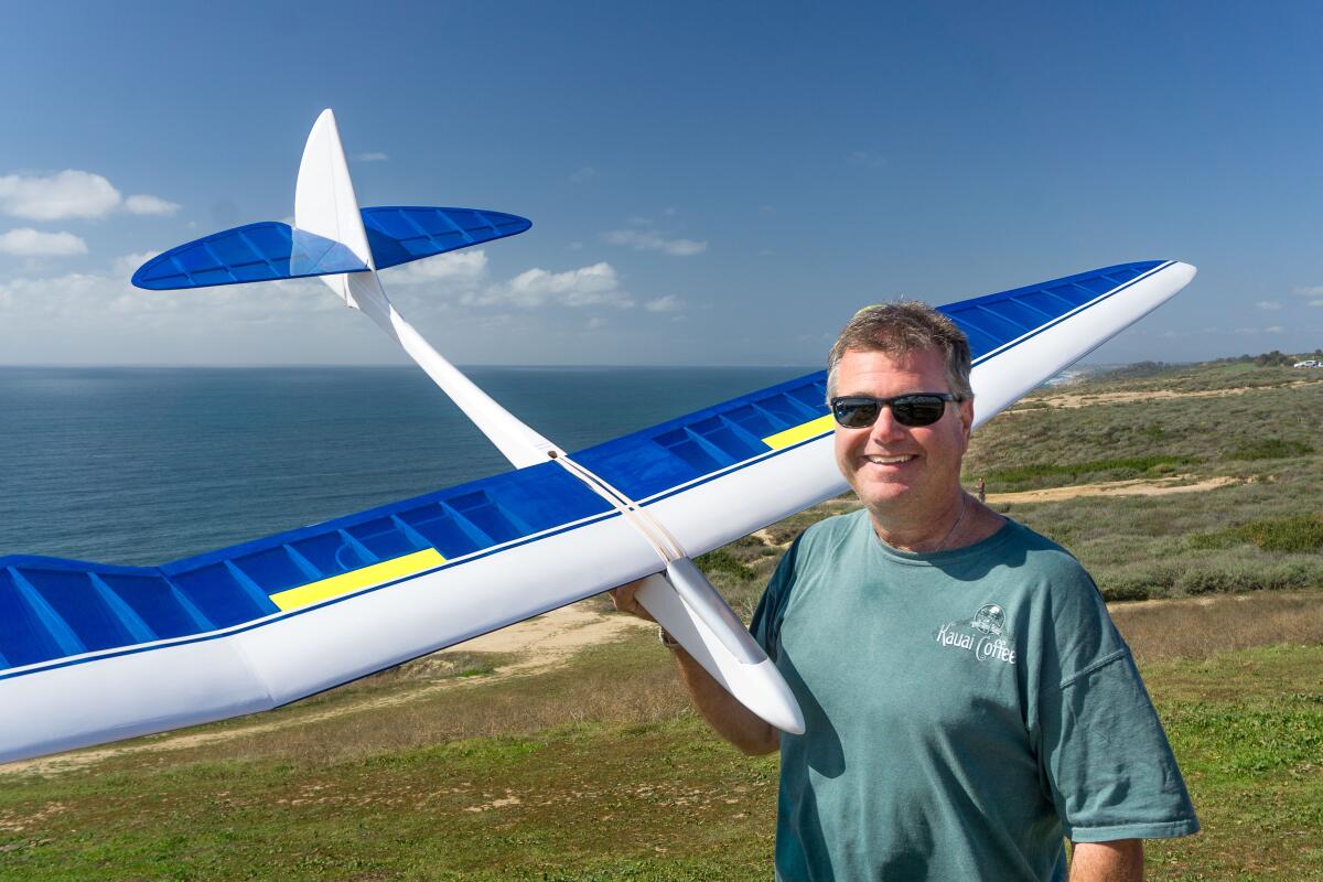 Mark Baldacchino holds his 1979-era Bird of Time RC model sailplane.