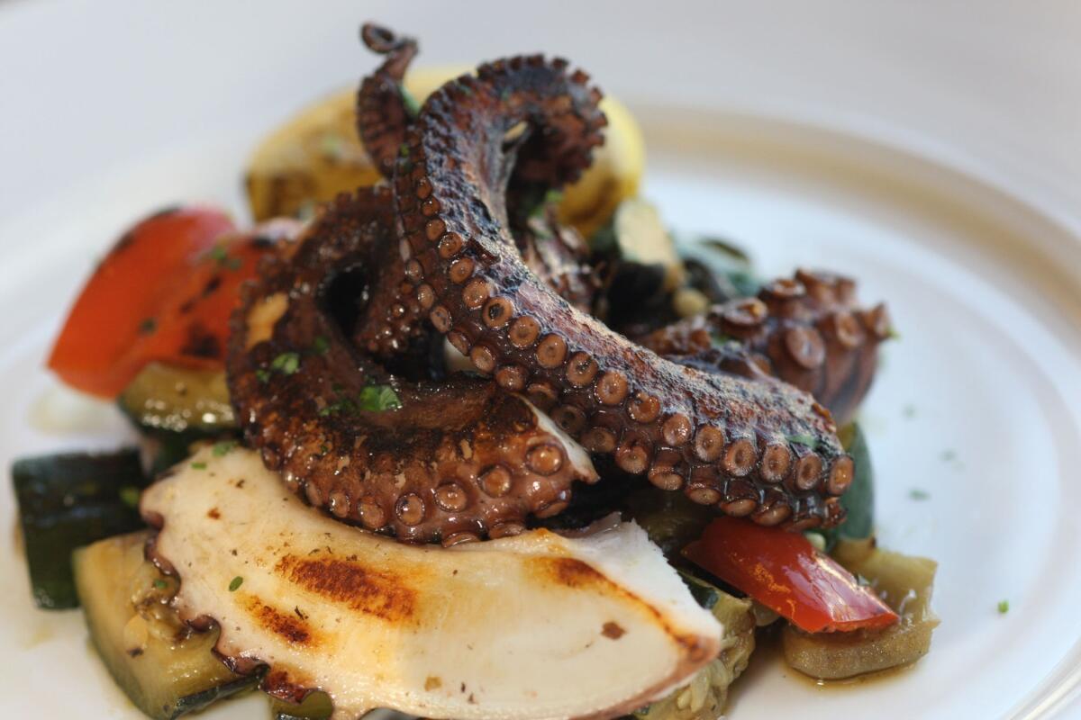 Piovra (grilled octopus over roasted vegetables).