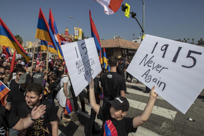 HOLLYWOOD, CALIF. -- WEDNESDAY, APRIL 24, 2019: Thousands of people join a march organized by Unified Young Armenians commemorating the Armenian Genocide on Hollywood and Hobart Boulevards in Hollywood, Calif., on April 24, 2019. (Brian van der Brug / Los Angeles Times)
