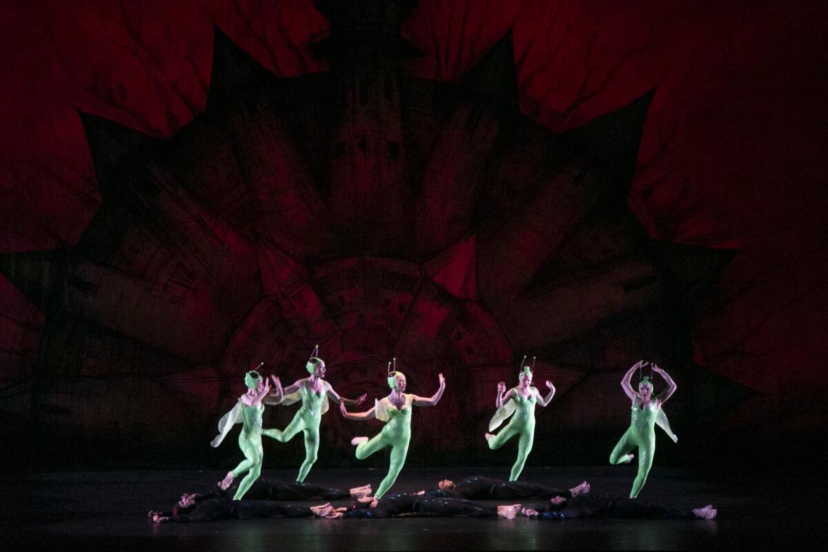 The Paul Taylor Dance Company's "Gossamer Gallants" on Saturday at the Dorothy Chandler Pavilion in Los Angeles featured had predatory bug-women flexing their muscles and men playing brainless bug-jocks in winged black costumes.