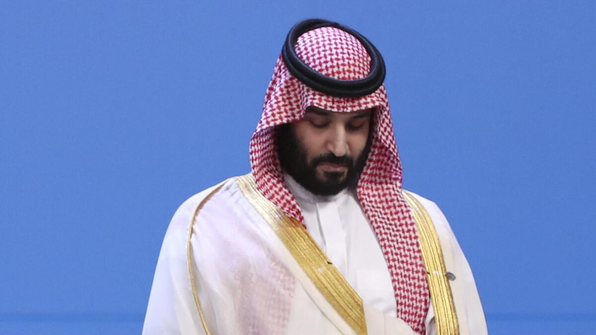 Saudi Crown Prince Mohammed bin Salman stands as leaders gather for a photo of the G20 Leaders' Summit in Buenos Aires on Nov. 30.