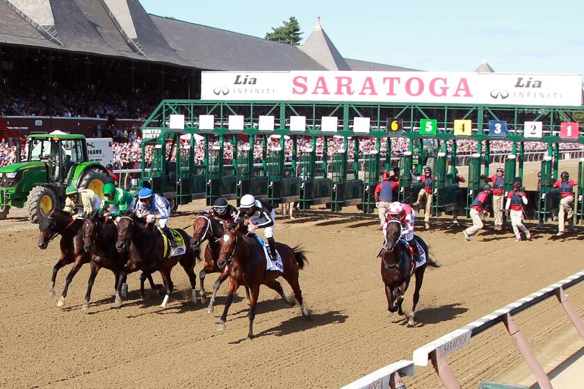 SARATOGA SPRINGS, NEW YORK - AUGUST 24: Midnight Bisou with Jockey Mike Smith.