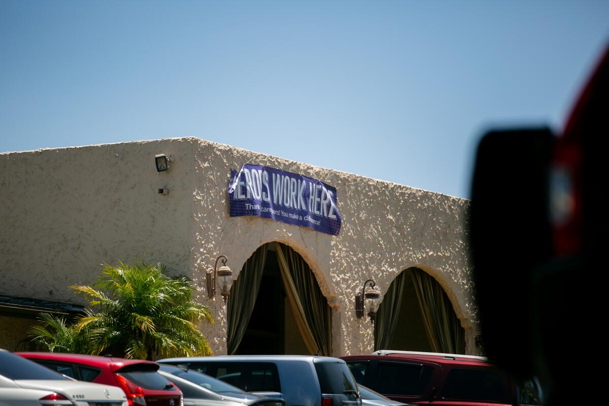 A sign thanking healthcare workers hangs outside the Reo Vista Healthcare Center.