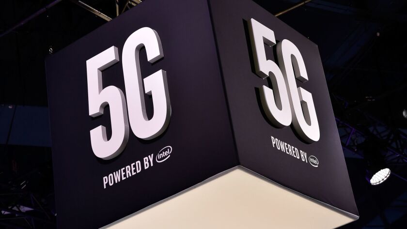 Signage for 5G technology is displayed at the Intel booth during this month's CES tech trade show in Las Vegas.