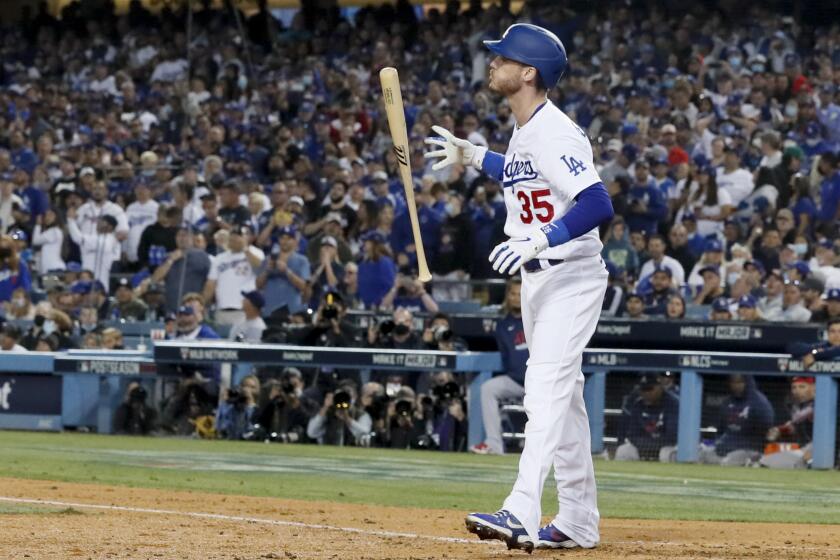 Los Angeles, CA - October 21: Los Angeles Dodgers' Cody Bellinger reacts after striking out during the third inning in game five in the 2021 National League Championship Series against the Atlanta Braves at Dodger Stadium on Thursday, Oct. 21, 2021 in Los Angeles, CA. (Robert Gauthier / Los Angeles Times)