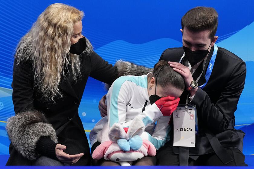 Kamila Valieva, of the Russian Olympic Committee, reacts after competing in the women's free skate program.