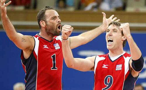 Ryan Millar, right, and Lloy Ball react to winning a point against Brazil during the men's volleyball final Sunday in Beijing.