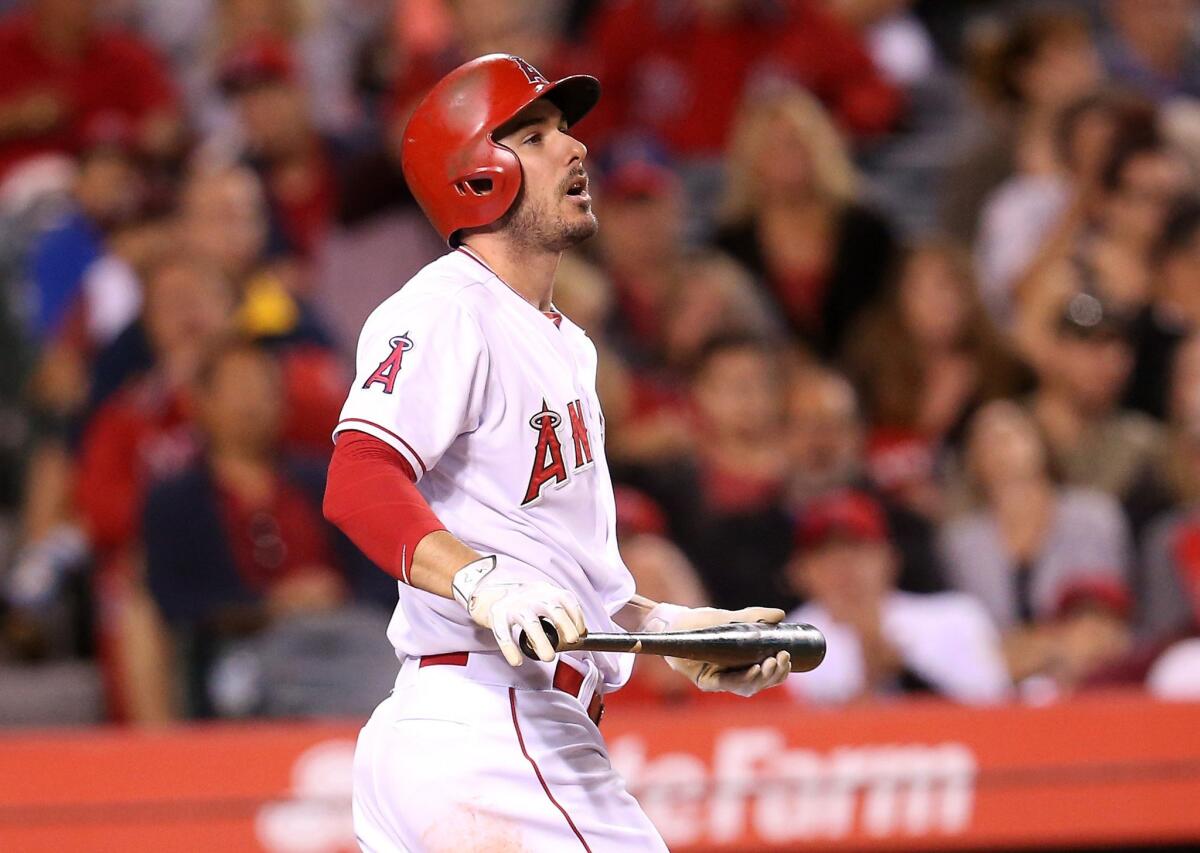 Angels outfielder Matt Joyce reacts after striking out in the eighth inning of a game against his former team, the Tampa Bay Rays, on June 3.