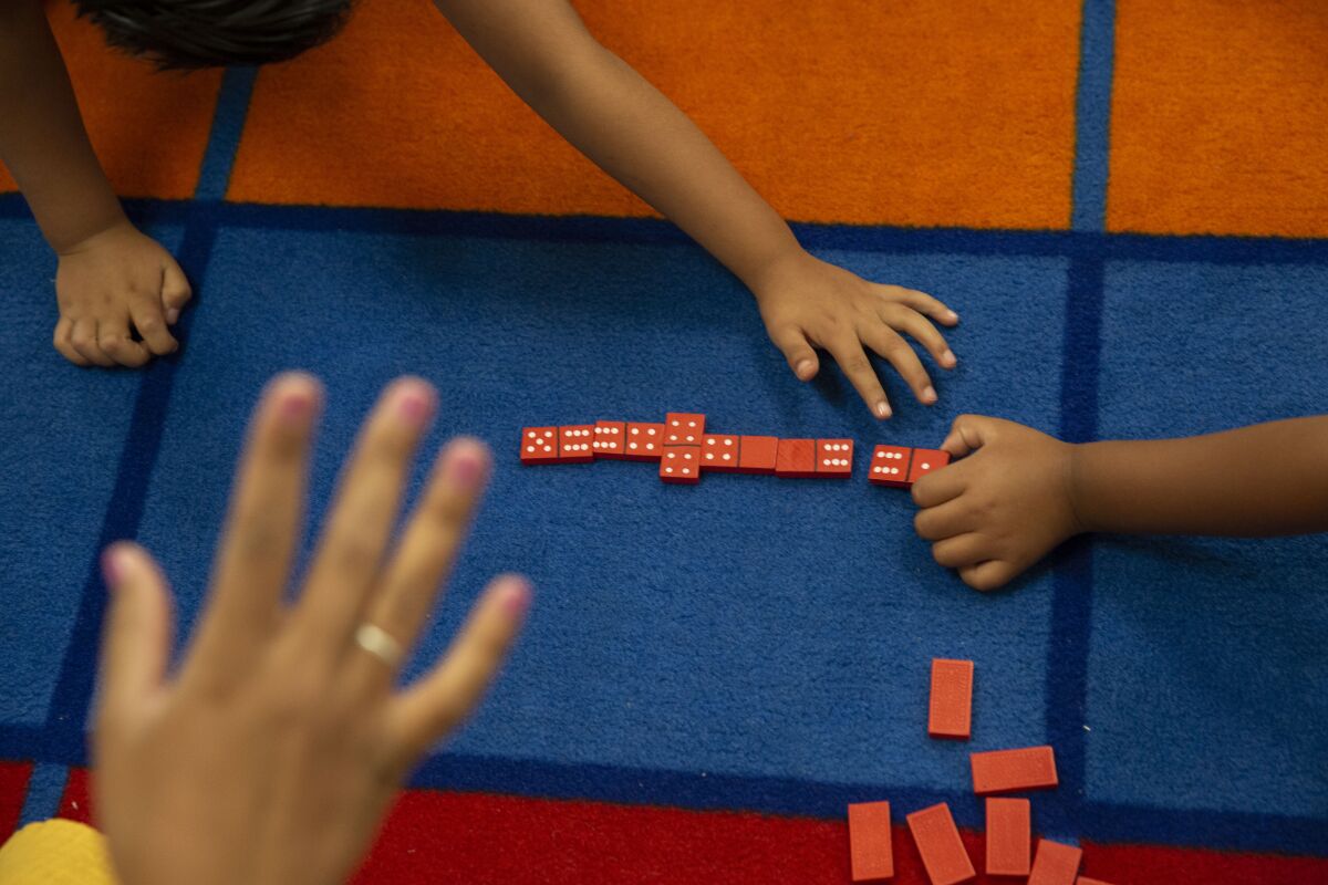 Children play math games at Esperanza Elementary School in Los Angeles in 2019. 