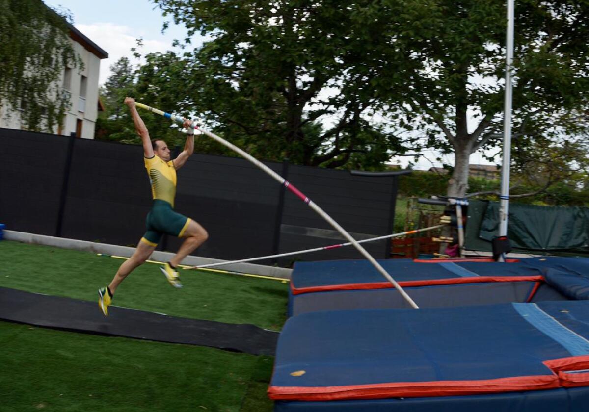 Renaud Lavillenie competes in a backyard pole-vaulting competition on Sunday.