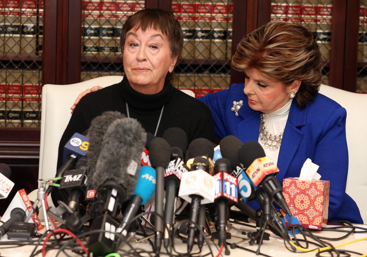 Helen Hayes, left, an alleged victim of Bill Cosby, speaks with attorney Gloria Allred at a December 2014 press conference in Los Angeles.