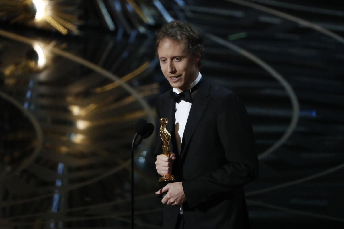 Director Laszlo Nemes for "Son of Saul" accepts the Oscar for foreign language film.