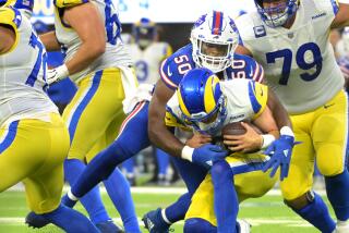 Inglewood, California September 8, 2022-Rams quarterback Matthew Stafford is sacked.