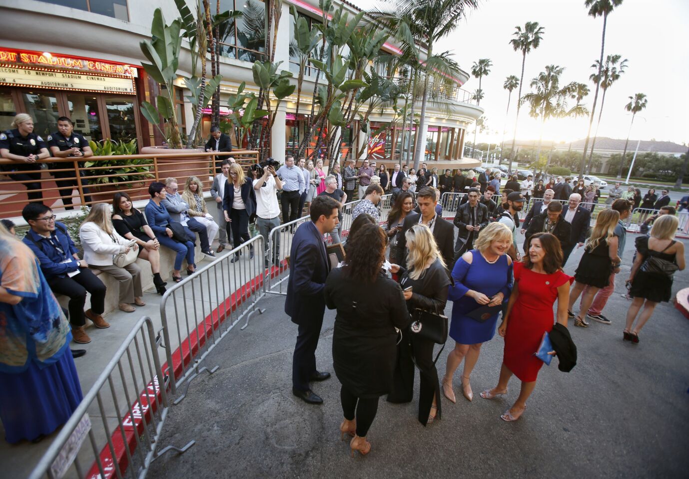 Patrons wait in line for the Newport Beach Film Festival's West Coast premiere of “Luce” at the Edwards Big Newport 1 during the opening night of the 2019 Newport Beach Film Festival on Thursday.