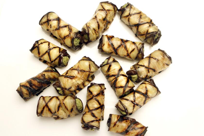 Walnut- and herb-stuffed eggplant rolls