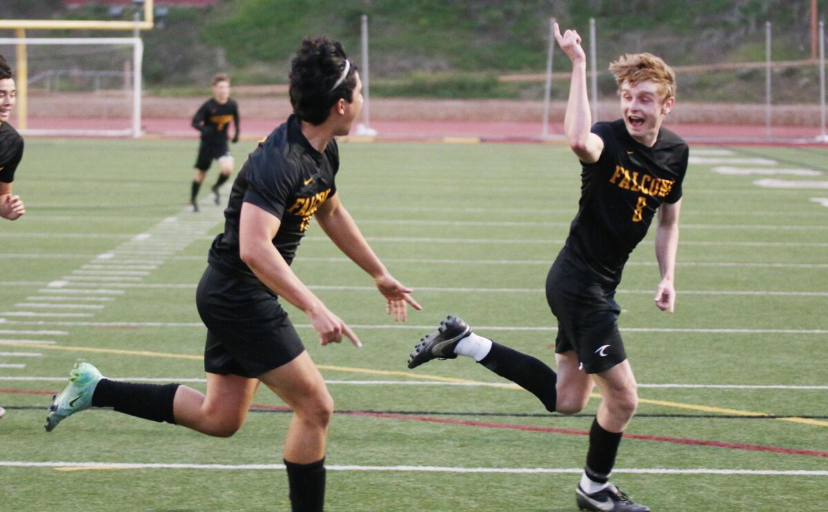 Dylan Gleason (left) and Mikey Sherlock both registered goals Tuesday night. Here they celebrate the former's score.