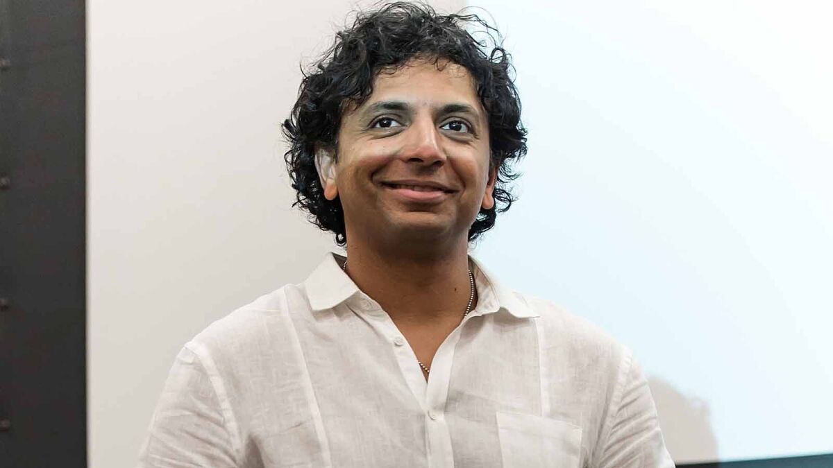 "You never want to put that paradigm shift [a twist] at the very end because you want to live in the new world," said M. Night Shyamalan, who directed the first episode and set the tone. Pictured at a "Wayward Pines" premiere episode screening and Q&A during Wizard World Comic Con in Philadelphia.
