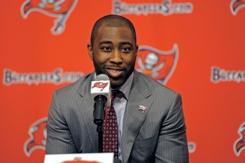 New Buccaneer Darrelle Revis addresses the media in Tampa Bay on Monday.