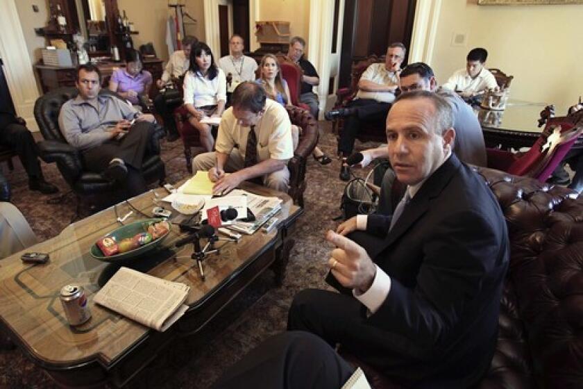 State Senate President Darrell Steinberg discusses with reporters the provisions of the proposed state budget deal.