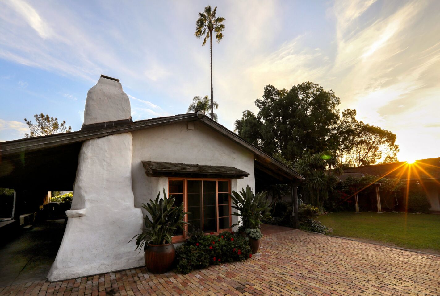 Exterior view of the Rancho Buena Vista Adobe at sundown. The historic property, owned by the city of Vista, will host two tours on Halloween night focused on the 1852 building's haunted history.