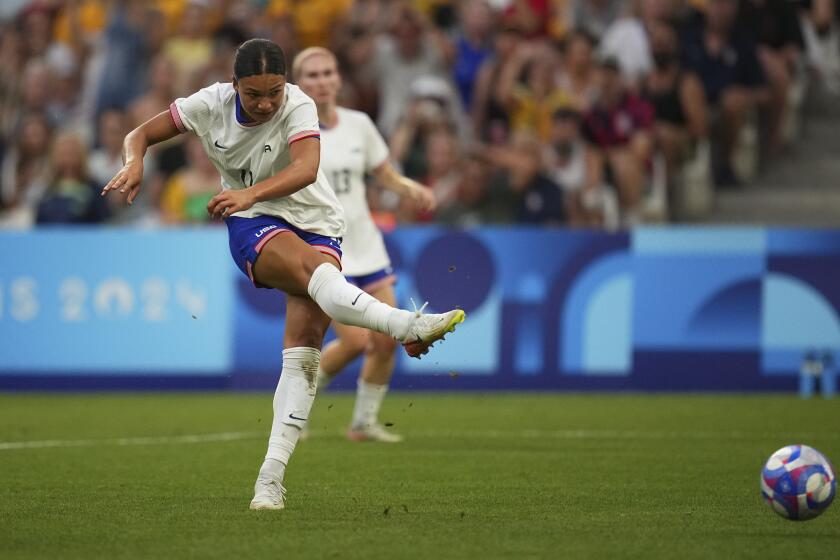 United States' Sophia Smith fires a shot during a women's Group B soccer match between Australia.