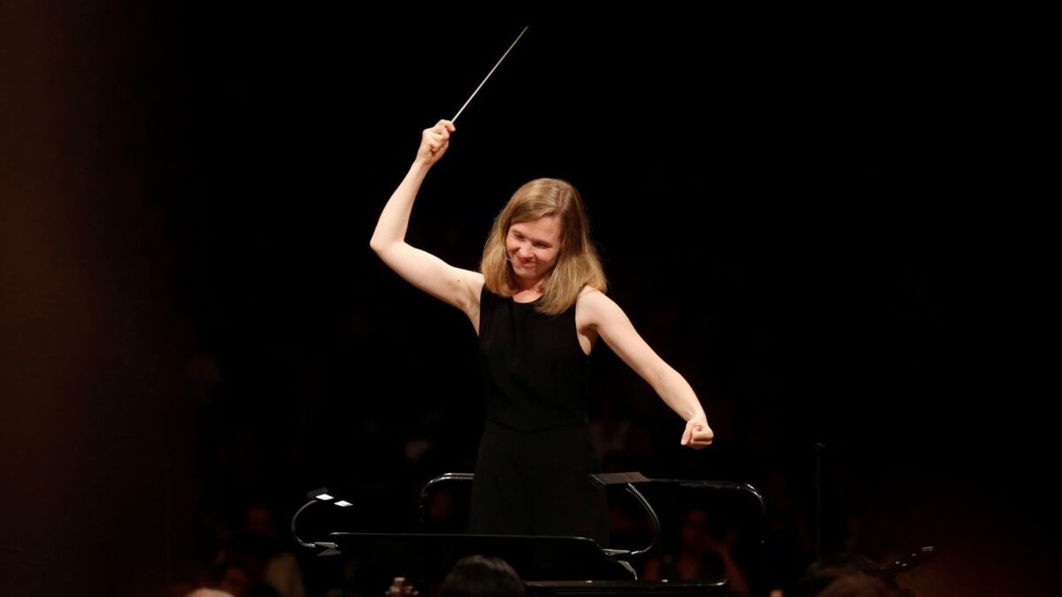 LA Phil associate conductor Mirga Grazinyte-Tyla leads the orchestra at the Hollywood Bowl.