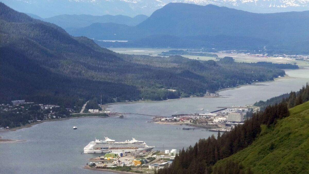 A cruise ship sits docked near downtown Juneau, Alaska.
