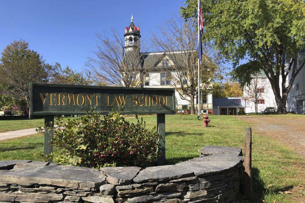 FILE - Vermont Law School, now called Vermont Law and Graduate School, in Royalton, Vt., is viewed Oct. 8, 2021. A federal appeals court in New York, Friday, Jan. 27, 2023, is considering whether the school modified a pair of large murals when it concealed them behind a wall of panels against the artist's wishes after they were considered by some in the school community to be racially offensive. (AP Photo/Lisa Rathke, File)