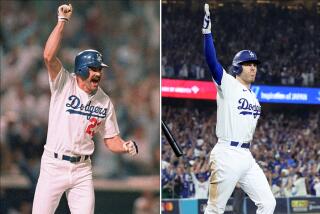 Dodgers greats Kirk Gibson and Freddie Freeman.