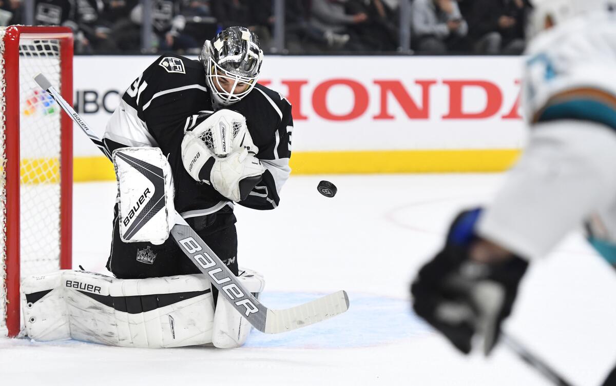 Kings goalie Peter Budaj makes a save against San Jose on Nov. 15. He has played in 21 consecutive games.