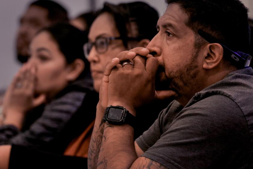 RIVERSIDE, CA. NOVEMBER 9, 2024: Marcos Sanchez and other members of the cvommunity listen to representatives from TODEC (Training Occupational Development Educating Communities) Legal Center. TODEC held a "Know Your Rights" session in Riverside at the Our Lady of Perpetual Help Catholic Church November 9, 2024. Members of the immigrant community in attendance are preparing for another Trump presidency by learning about citizenship and are receiving legal advice from TODEC. (Mark Boster / For The Times)