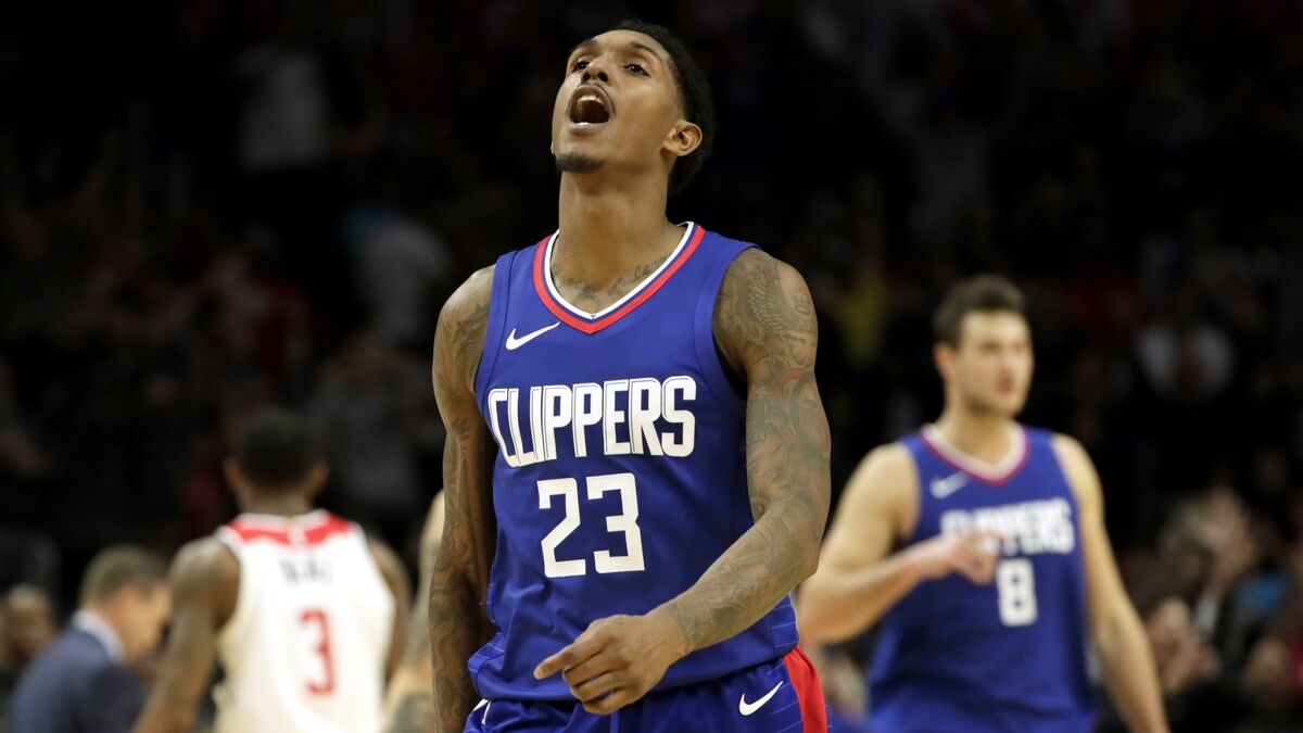 Clippers guard Lou Williams exults after making the game-winning three-pointer to beat the Wizards.
