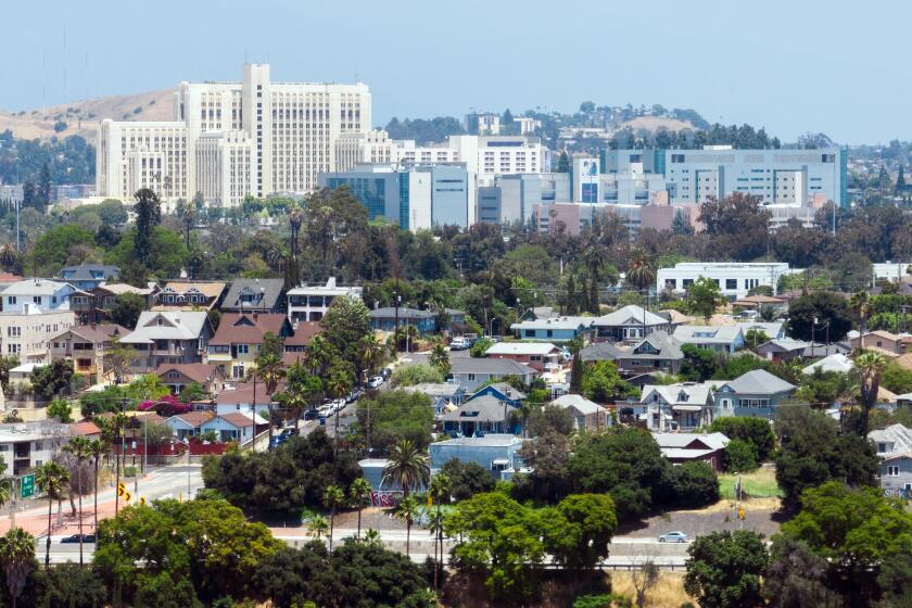 LOS ANGELES, CA - JUNE 20: View of LA General Medical Center. The historic building on the left was damaged in the 1994 Northridge earthquake and now houses a wellness center. A new 600-bed replacement hospital was built to the right. Photographed in Los Angeles, CA on Tuesday, June 20, 2023. (Myung J. Chun / Los Angeles Times)