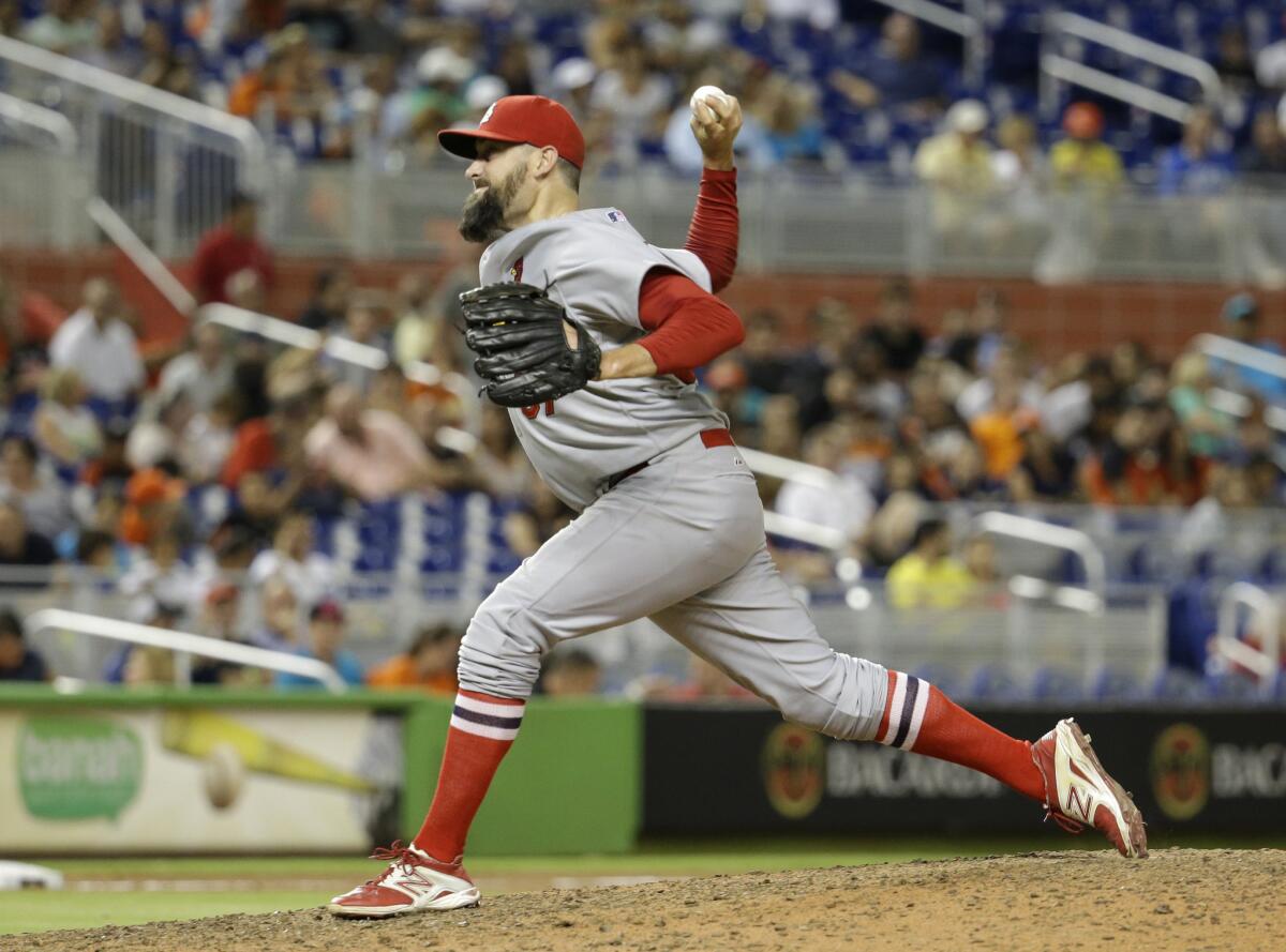 Pat Neshek agreed to a $12.5-million contract with the Houston Astros.