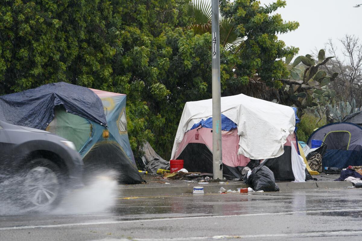 A small encampment in downtown on 17th Street, near the on-ramp to Interstate 5 southbound