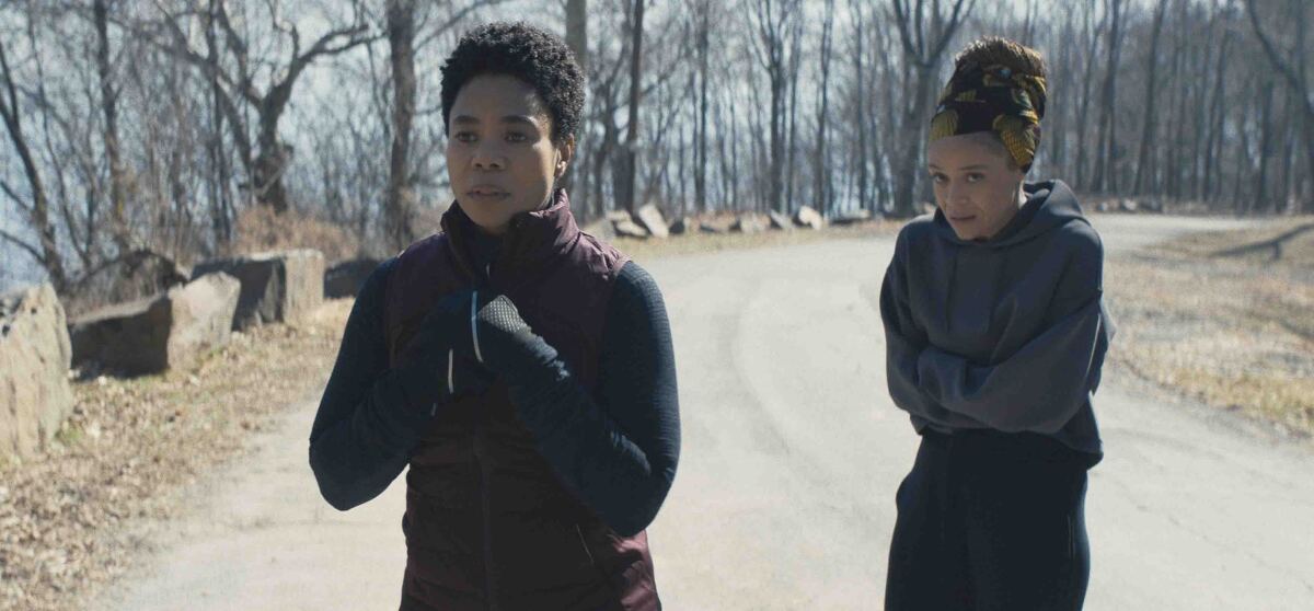 This image released by Amazon Studios shows Regina Hall, left, and Amber Gray in a scene from "Master." (Amazon Studios via AP)