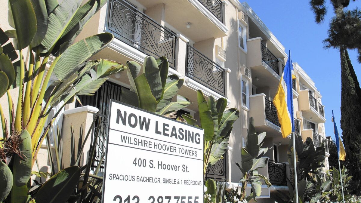 Average rents in L.A. County are projected to rise 8.2% to $1,857 by mid-2016, 8.6% to $1,807 in Orange County and 9.9% to $1,189 in the Inland Empire, according to a USC study. Above, apartments in Koreatown.