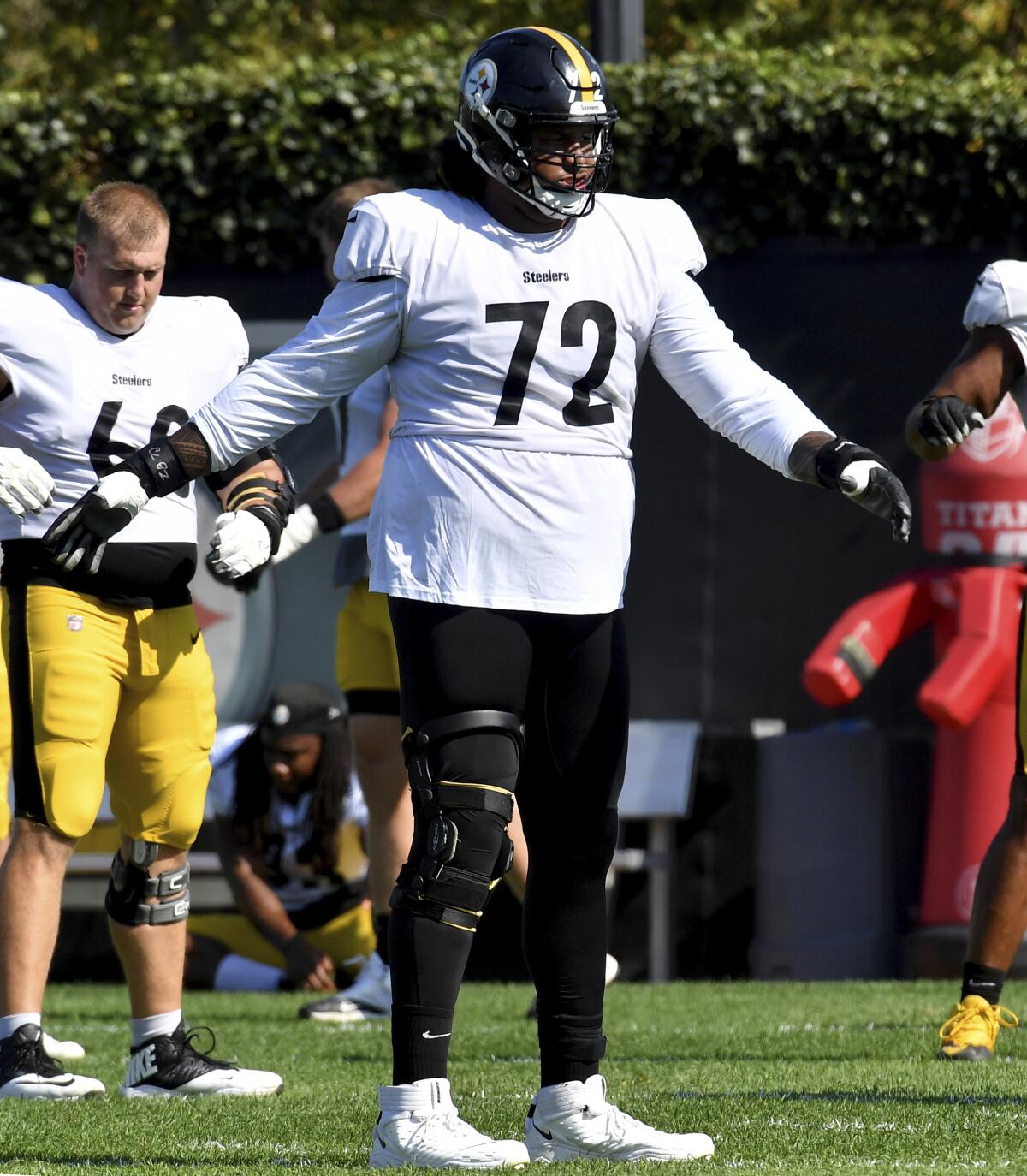 Pittsburgh Steelers offensive tackle Zach Banner stretches during NFL football practice, Wednesday, Oct. 6, 2021, in Pittsburgh. (Matt Freed/Pittsburgh Post-Gazette via AP)
