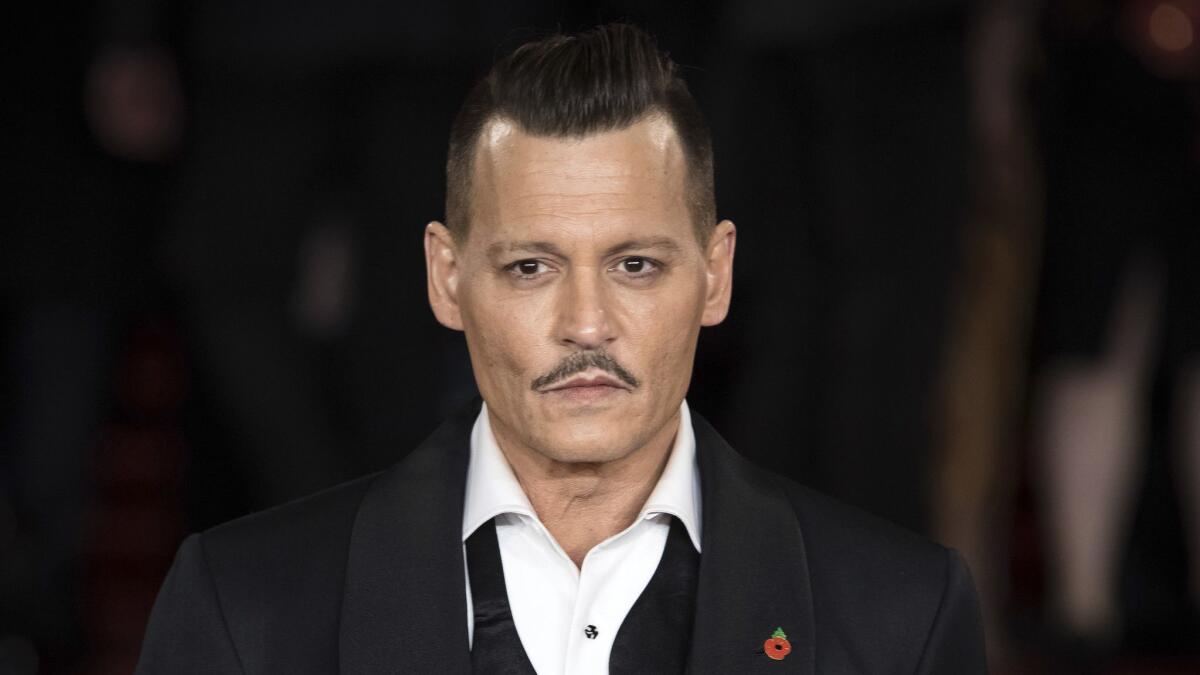 Johnny Depp is facing a lawsuit alleging that the actor assaulted a location manager on the set of upcoming film "City of Lies."