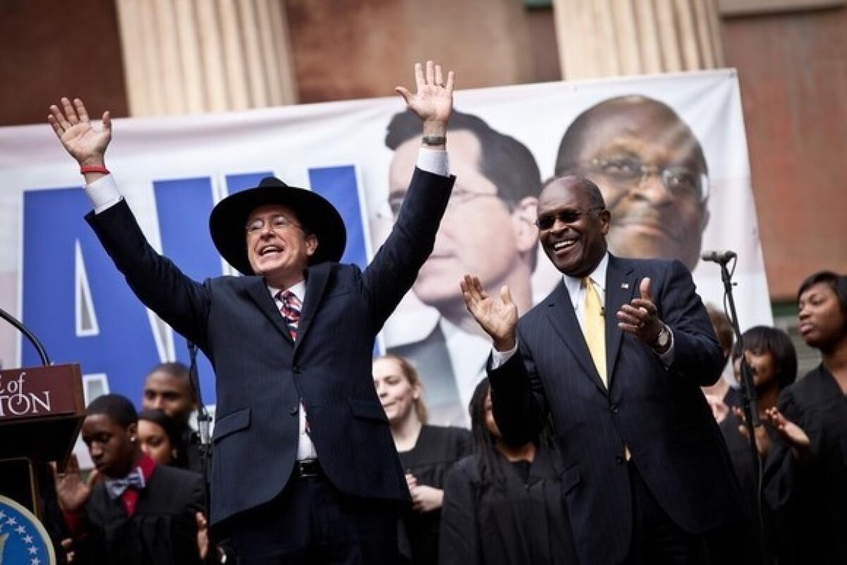 Comedian Stephen Colbert holds a rally with former GOP presidential candidate Herman Cain at the College of Charleston on Jan. 20, 2012 in Charleston, S.C.