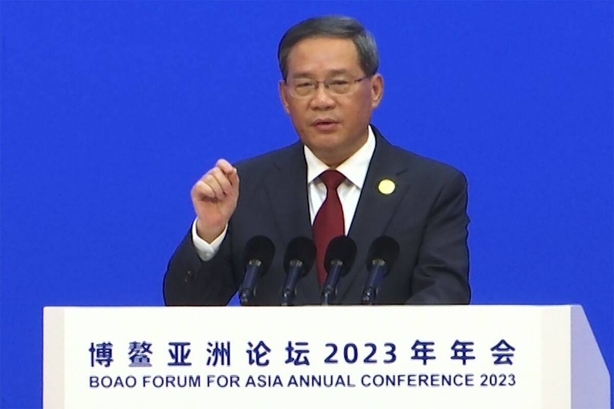 In this image taken from video, Chinese Premier Li Qiang speaks at the opening ceremony of the Boao Forum for Asia in Boao in southern China's Hainan Province, Thursday, March 30, 2023. (AP Photo/Dake Kang)