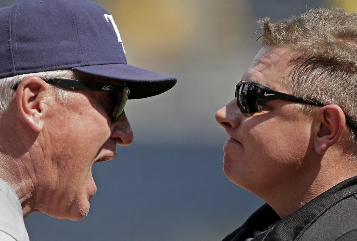 Getting into the "defensive peripersonal space" of plate umpire Greg Gibson, right, got Tampa Bay Rays Manager Joe Maddon thrown out of a game Monday.