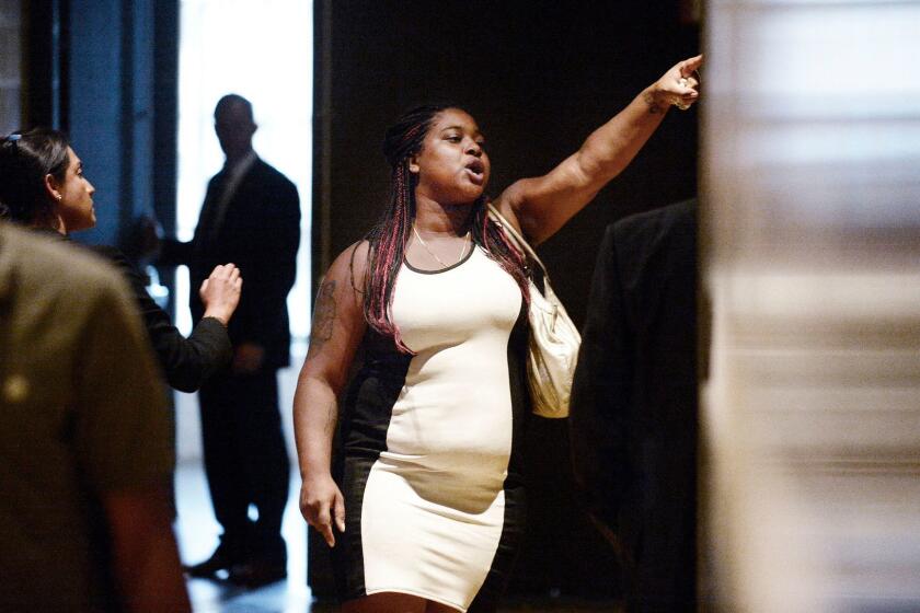 Erica Garner, the daughter of Eric Garner, who was choked to death by a police officer on Staten Island, asks to speak with President Barack Obama on July 14, 2016 at a town hall hosted by ABC to engage directly with officers, parents, students, community leaders and families on trust and safety in the communities at the Studio Theater in Washington, D.C. Doctors have declared Erica Garner as brain dead with no chance of recovery five days after the mother of two suffered a massive heart attack. (Olivier Douliery/Abaca Press/Pool/TNS) ** OUTS - ELSENT, FPG, TCN - OUTS **