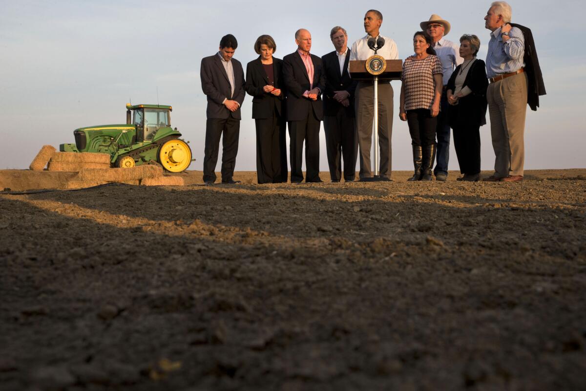 President Obama speaks about the drought after touring a farm in Los Banos, Calif., last week. With him were Sens. Dianne Feinstein, second from left, Barbara Boxer, second from right, Gov. Jerry Brown, third from left, and other dignitaries.